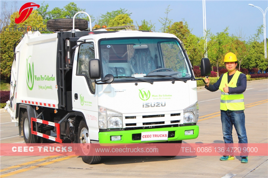 Truk pemadat sampah ISUZU 5cbm